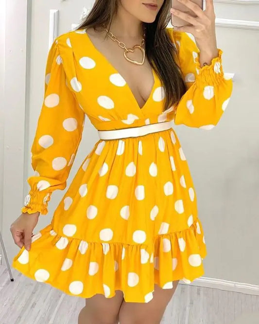 Abito da donna giallo con scollo a V a pois bianchi